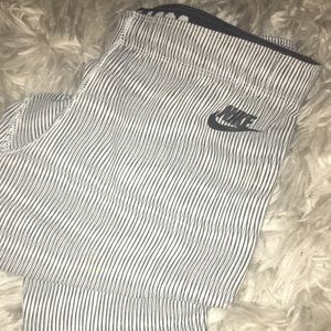 Grey and white striped Nike leggings